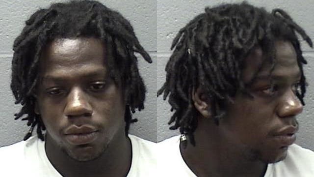 Man charged with illegal gun possession after Elgin traffic stop