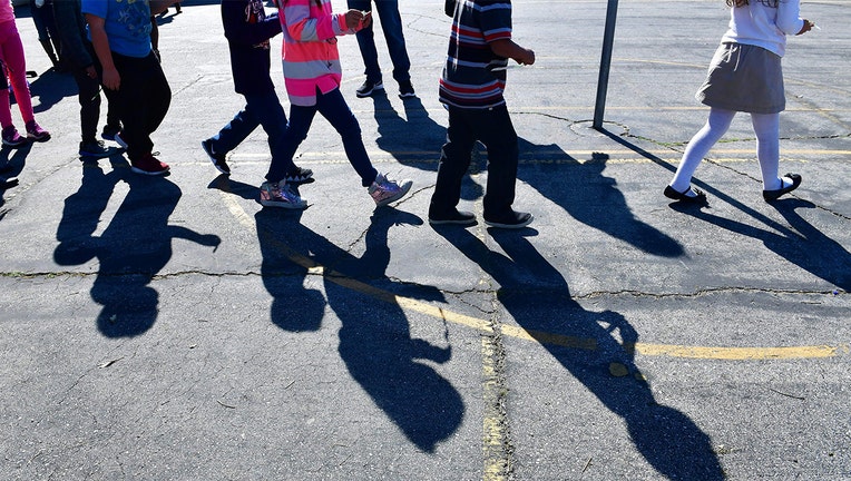 Getty-children-walking