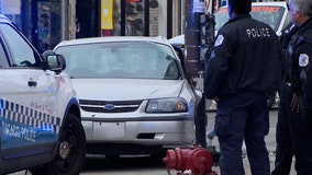 Driver slams into Chicago police squad car, injuring three