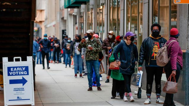 Voters come out in force for Chicago's first day of voting