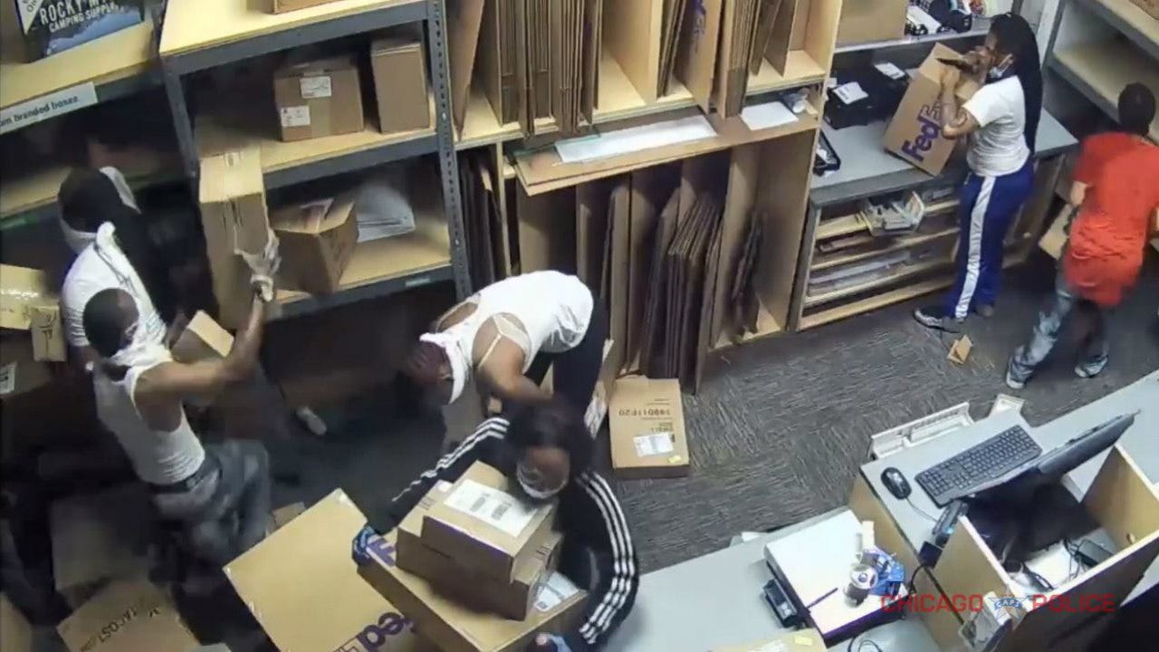 Police share video of people looting downtown FedEx store