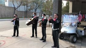 Election Day: Mariachi bands play for voters waiting in line