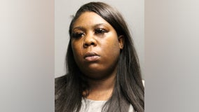 Woman charged with looting downtown store