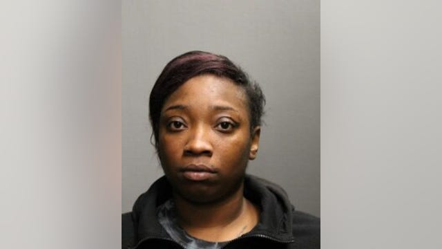 Woman charged with looting and burglary in August