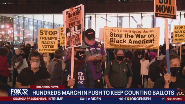 Demonstrators march in Chicago to demand the counting of all votes