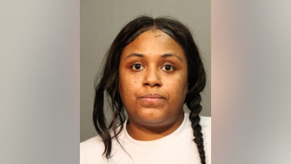 Woman charged with looting downtown shop in August