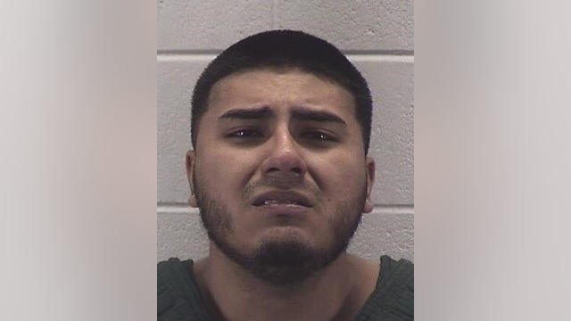 Aurora man charged with strangling woman to death during argument