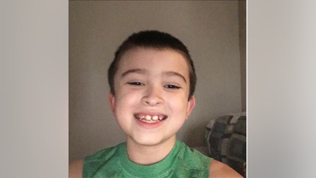 8-year-old boy taken from Christmas gathering safe, parents in custody