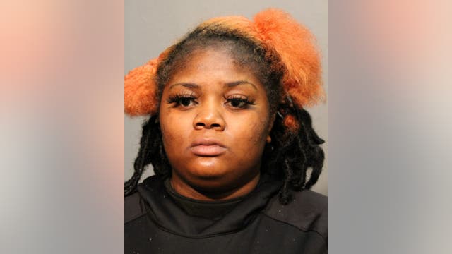 Woman charged with looting Mag Mile business in August