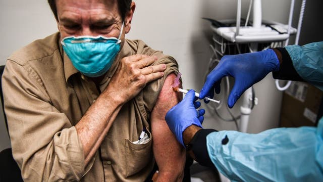 Illinois’ top doc says wide vaccine availability months away