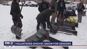 Chicago volunteers help clear snow for seniors, others after winter storm