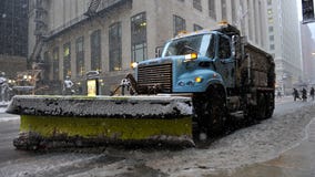 Plows hitting the road overnight to combat freezing rain and snow