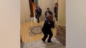 US Capitol Police officer hailed as hero for diverting pro-Trump mob during riot