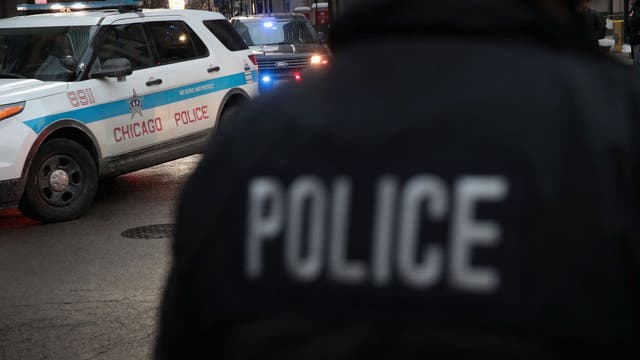 Man shot in the head, crashes car into light pole in Montclare