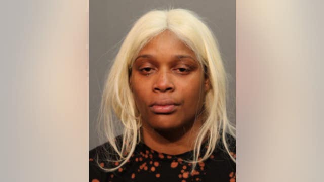 Woman charged in August downtown looting