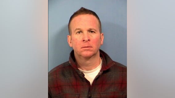 Suburban police commander charged with child porn