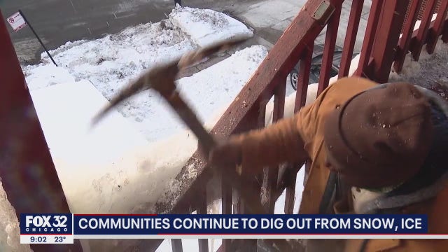 Chicagoans using pickaxes and hammers to get rid of thick ice and snow