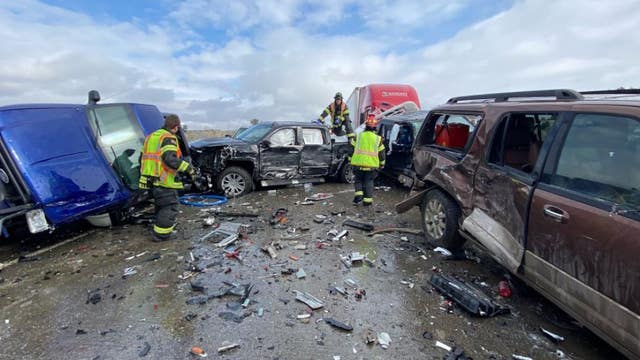 Dozens of cars involved in icy bridge crash, and two people hurt jumping off bridge out of the way