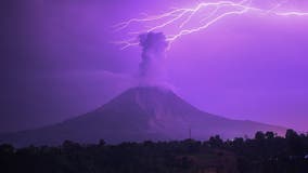 Lightning strikes erupting Indonesia volcano spewing 16,000-foot ash cloud