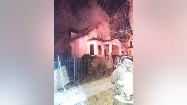 Firefighter OK after partially falling through floor of burning West Englewood home