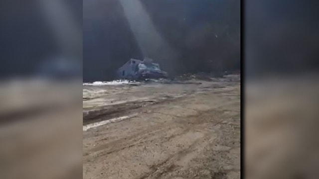 Vehicles swallowed when massive embankment collapses in Kentucky