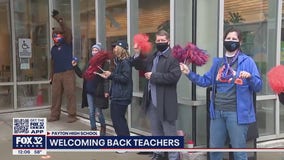 Parents, guardians welcome back teachers at Walter Payton College Prep