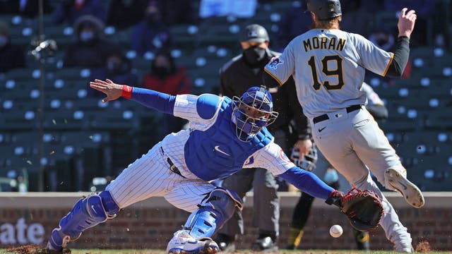 Pirates homer, relievers dominate to beat Cubs 5-3 on chilly Opening Day
