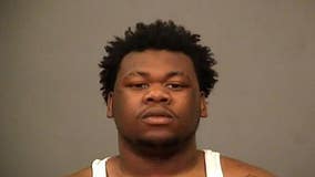 Joliet man, juvenile arrested after officers recover handguns, rifle from residence