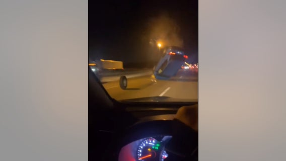 Driver goes airborne after hitting wheel rolling down highway, video shows