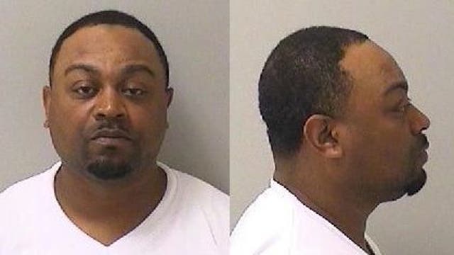 Man charged after stolen gun found during Kane County traffic stop