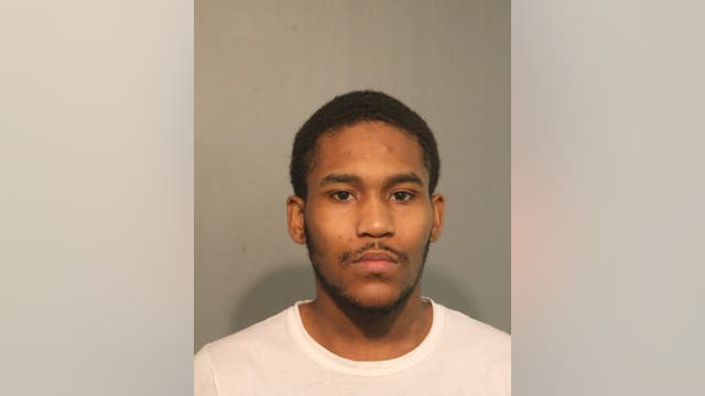 21-year-old charged with looting downtown business in August