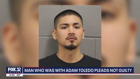 Man with Adam Toledo the night he was fatally shot by police pleads not guilty to gun charges