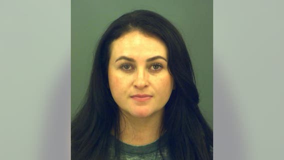 Woman arrested for posing as 13-year-old daughter at school, video shows