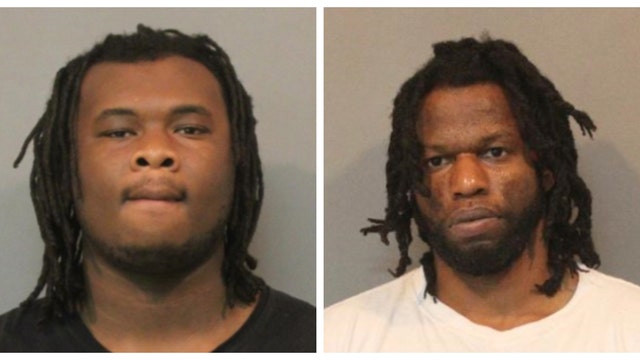 One suspect remains at-large after two charged with 'hazmat' suit Munster bank robbery