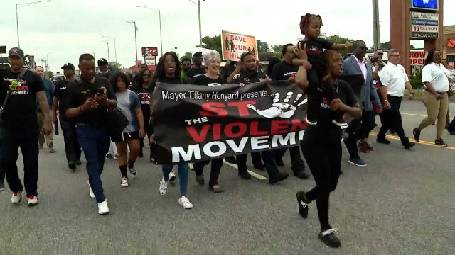 Dolton mayor Tiffany Henyard leads march against gun violence