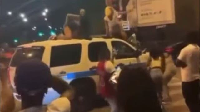 Chicago police investigating video of women dancing on squad car