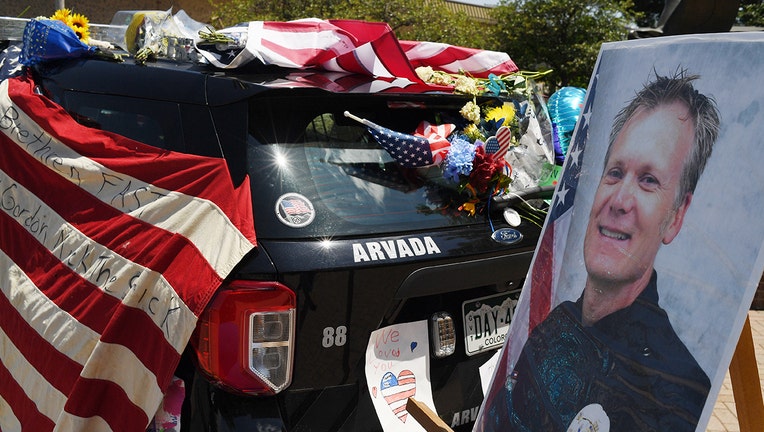 Memorial for Gordon Beesley after shooting in Olde Town Arvada