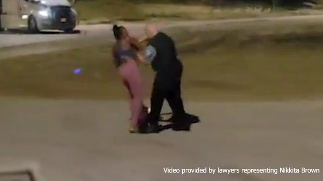 Chicago police officer who grabbed Black woman walking her dog is placed on desk duty