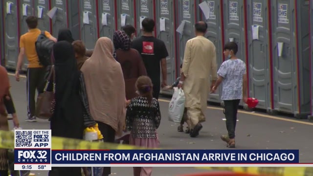 Flight carrying Afghan children arrives in Chicago