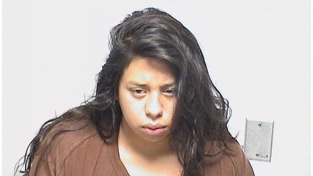 Illinois woman accused of trying to kick out window of squad car, headbutting deputy