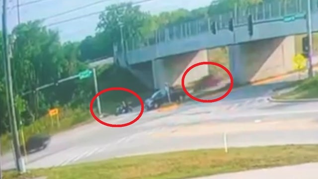 Video shows SUV striking motorcycle in Kane County and then fleeing the scene
