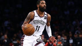 Nets' Kyrie Irving won't play with team until he is 'eligible to be a full participant'