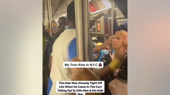Video: Man punches woman in face on crowded subway