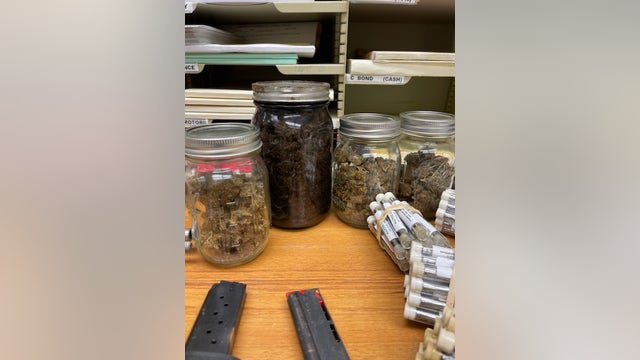 Guns, drugs discovered inside vehicle headed to junkyard from towing lot in Blue Island