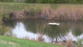 Person found dead inside car in suburban pond