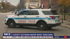 4 wounded in drive-by shooting in West Town