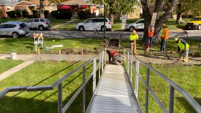 Chicago pours new sidewalk after quadriplegic woman stuck inside home for days