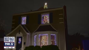 Spinning Christmas tree that appears to go through roof of home wows Jefferson Park