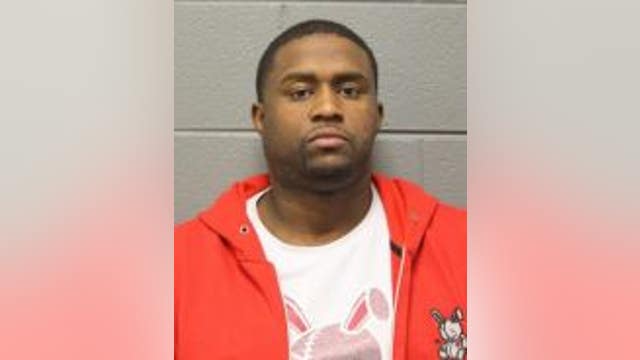 Oak Park man charged with robbing Little Village business while armed with handgun