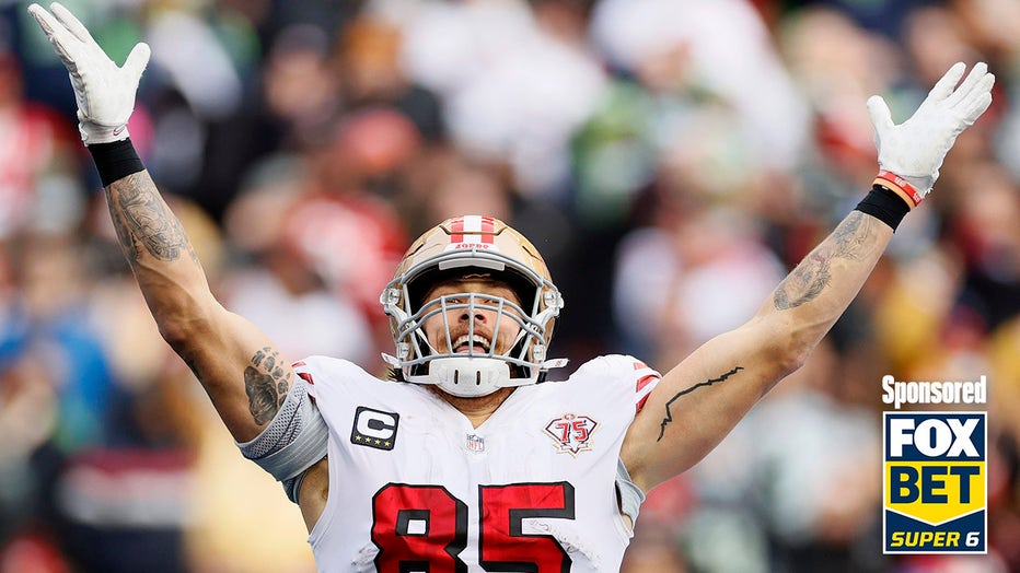 George Kittle of the San Francisco 49ers reacts after scoring a touchdown during the second quarter against the Seattle Seahawks at Lumen Field on December 05, 2021. (Photo by Steph Chambers/Getty Images)